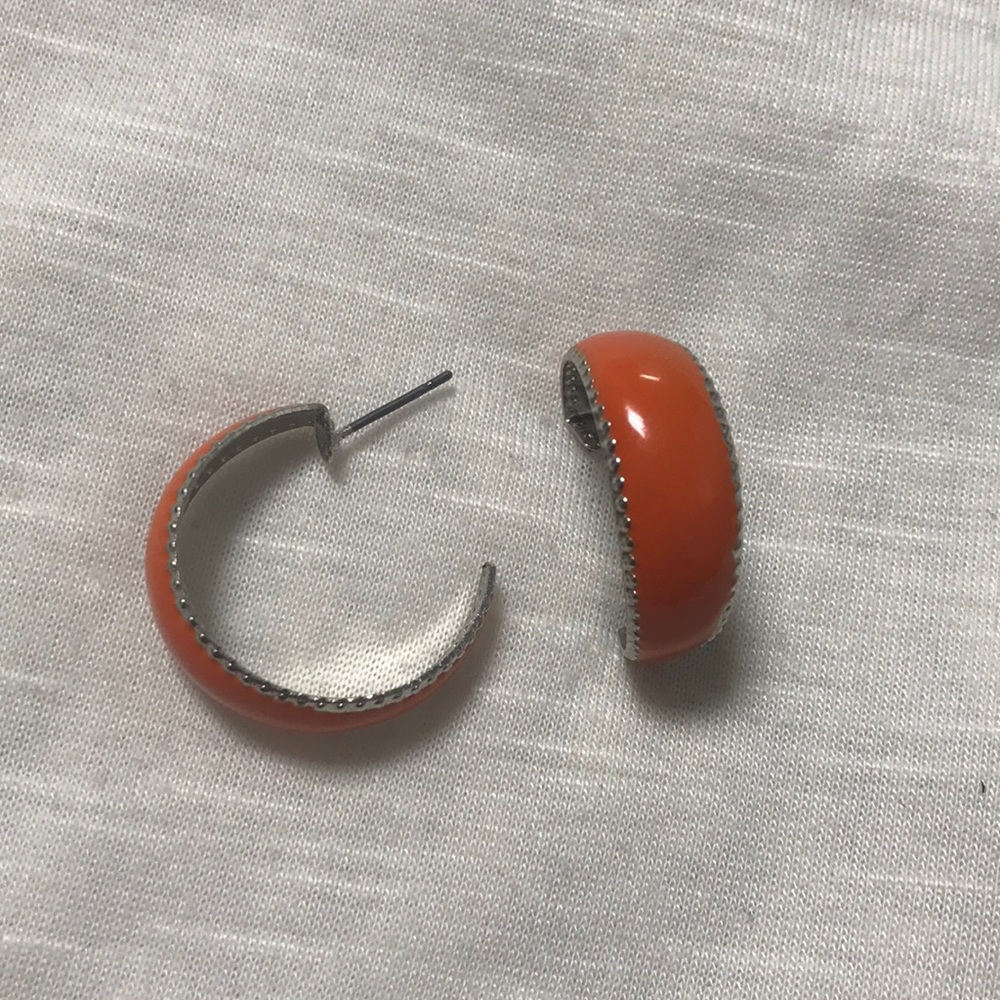 Orange hoops earrings with silver on the edges